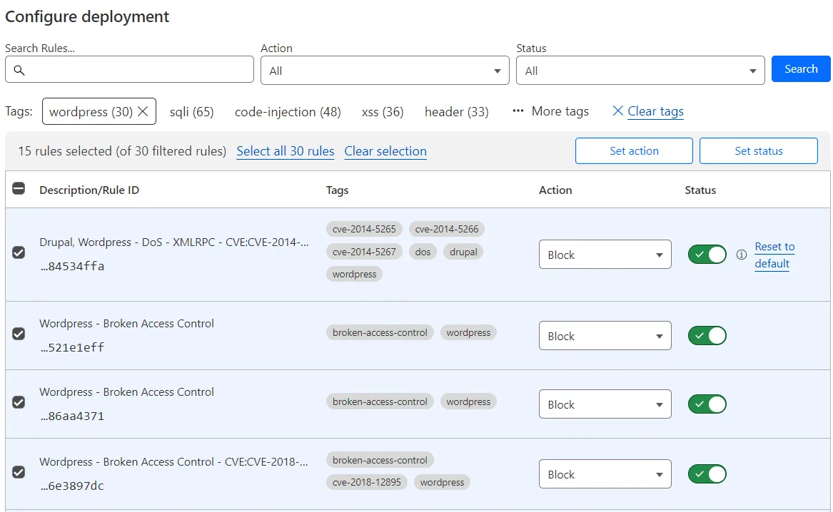 Selecting all rules in a page displays additional drop-down lists above the table to override the behavior of several rules at once.